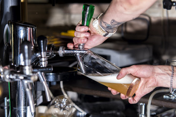 bartender pouring beer