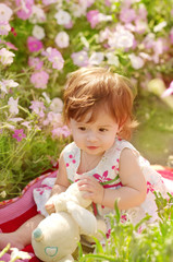Summer portrait of beautiful baby girl
