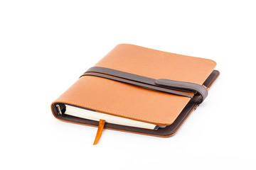Brown leather diary book.