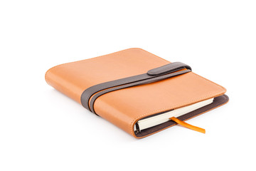 Brown leather diary book.