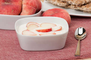 Healthy Breakfast. Fresh Peaches With Low Fat Yogurt. Crisp Brea