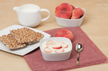 Healthy Breakfast. Fresh Peaches With Low Fat Yogurt. Crisp Brea