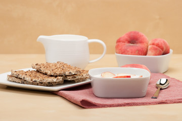 Healthy Breakfast. Fresh Peaches With Low Fat Yogurt. Crisp Brea