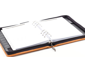 Brown leather cover of binder notebook.