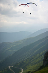 Fototapeta na wymiar together, paragliding on Alps