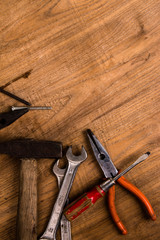 old tools on wooden background