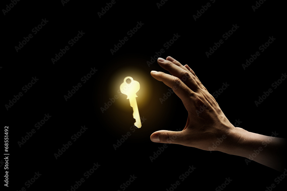 Wall mural Key in hand