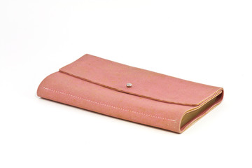 Old leather purse on white background