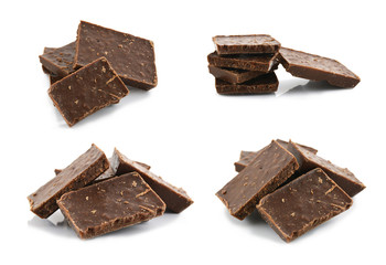Closeup detail of chocolate parts on white background.