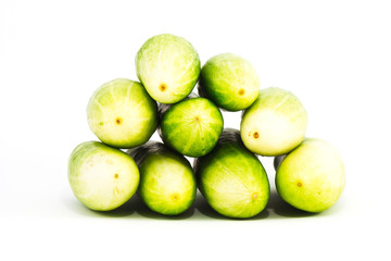 a pile of cucumber on white background