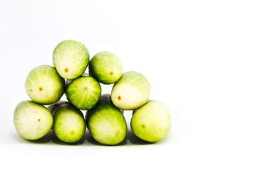 a pile of cucumber on white background