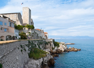 The medieval Grimaldi Tower and city wall of Antibes, France