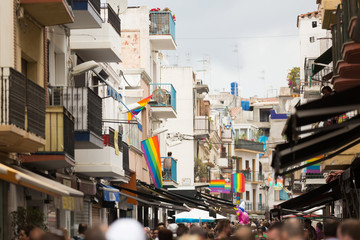 Street with rainbow flags in Sitges