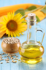 Obraz na płótnie Canvas sunflower oil, seed and sunflower