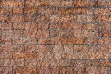 Natural granite stone tiles wall for background and texture