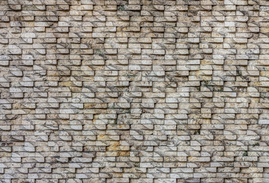 Natural stone tiles wall for background and texture