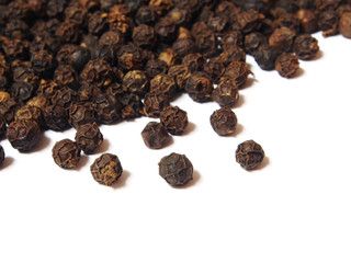 Black pepper peppercorn isolated on white background