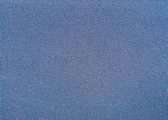 Texture of a blue woven synthetic waterproof fabric