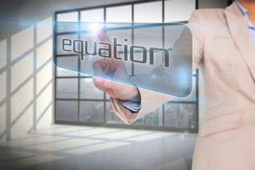 Businesswoman pointing to word equation