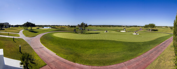 Fototapeta premium Wide landscape view of a golf course panorama.