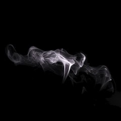 Fototapeta premium Abstract smoke isolated on black