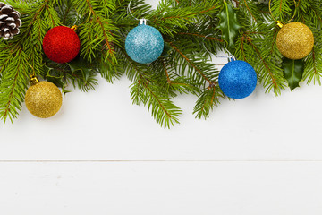 Christmas decoration on the wooden white background with snow or