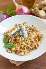 Fregola con sardine e zenzero, cucina sarda