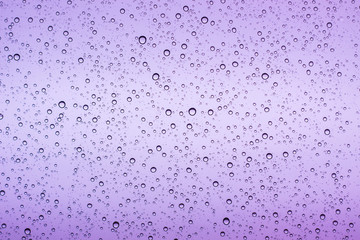 Water droplets on the glass while it was raining.