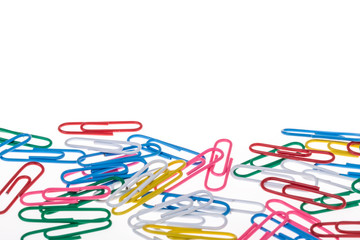 colorful paper clips on white