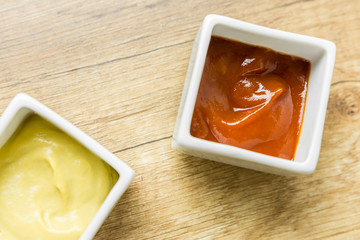 Mustard And Ketchup Sauce In White Bowl