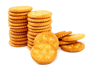 Stack of cracker biscuits on a white background.