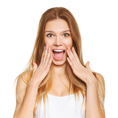 Surprised happy beautiful woman in excitement. Isolated