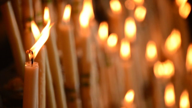 Candles at candlestick in church