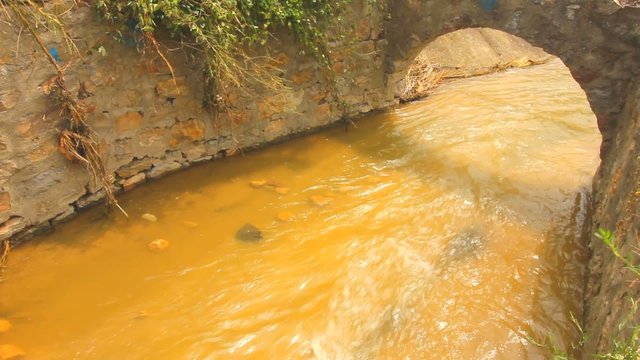 wastewater runs through old sewer canal