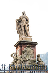The statue of a man at the old bridge in Heidelberg