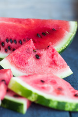 bite juicy, sweet slices of watermelon