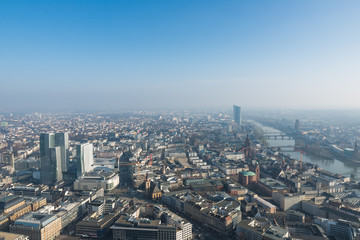 Fototapeta na wymiar The cityscape of Frankfurt with Main River in winter time