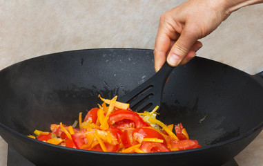 Cooking yellow beans with vegetables, delicious vegetarian dish.