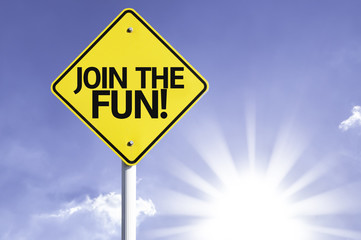 Join The Fun road sign with sun background