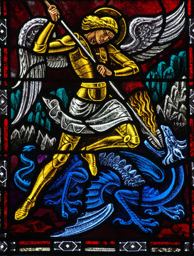 Angel Michael fighting a dragon