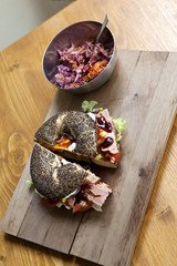 Bagel with ham, vegetable and salad