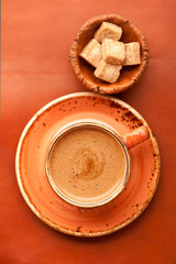 Coffee cup and sugar