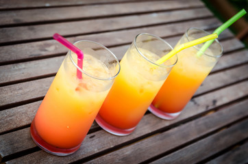 Three tequila sunrise cocktails