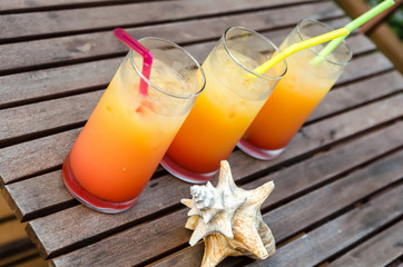 Three tequila sunrise cocktails
