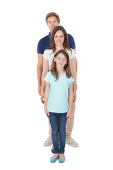 Portrait Of Family Standing In Line