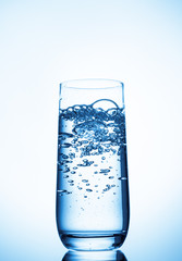 water glass on blue background