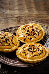 tartlets with pumpkin cream for Halloween for kids