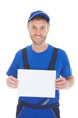 Confident Male Servant Holding Blank Placard