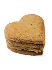 Stack of heart shape cookies isolated on white background