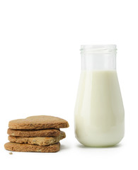 Stack of cookies and milk bottle